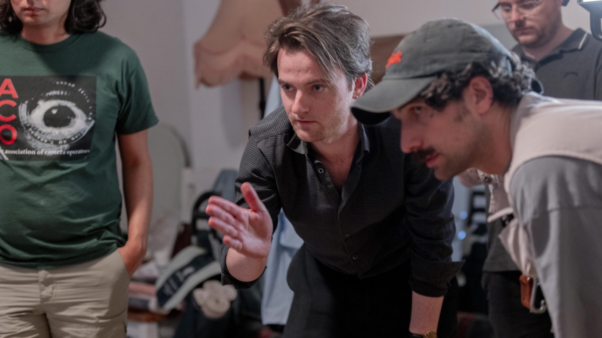 Adam O’Regan directing on set