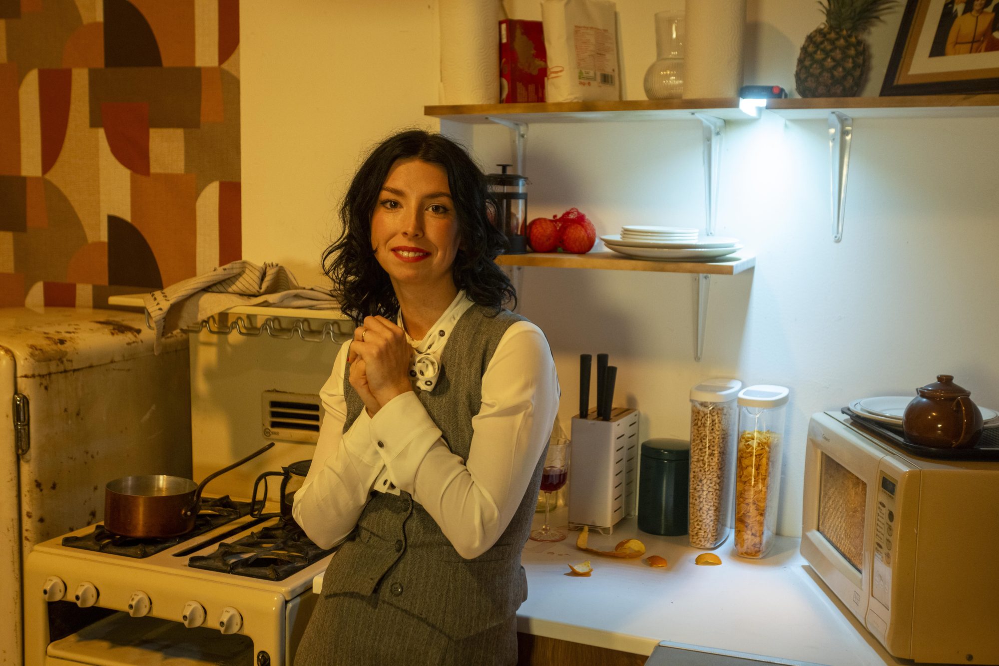 Faye O’Rourke in the kitchen set