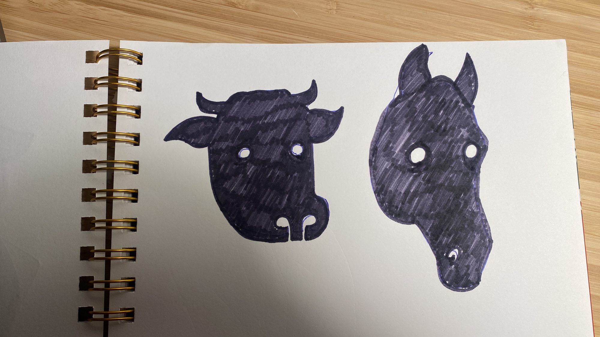 Sketchbook studies of bull and horse heads